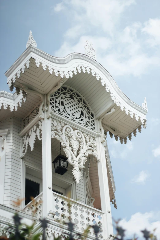 a tall tower with ornate designs on the top