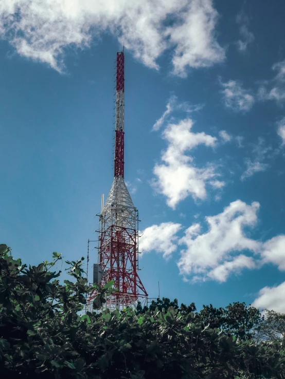 a tall tower that has a sky background