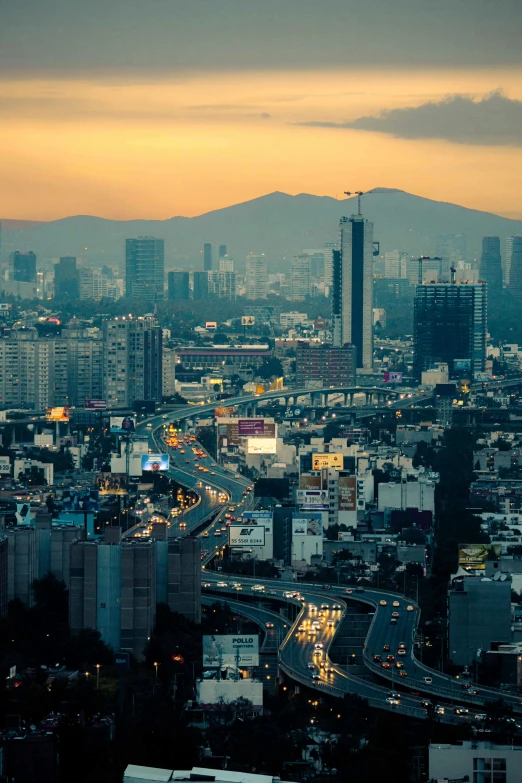 a large city skyline with skyscrs at night