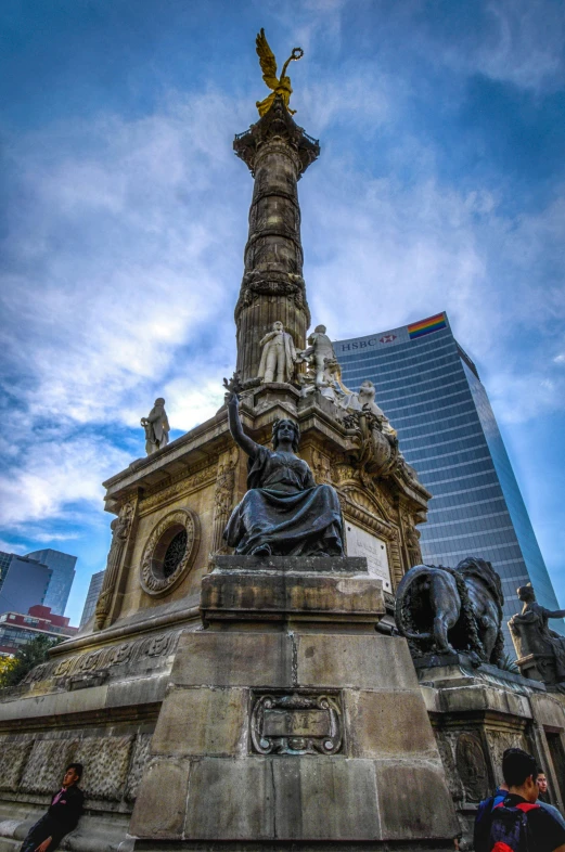 a statue in the center of the city