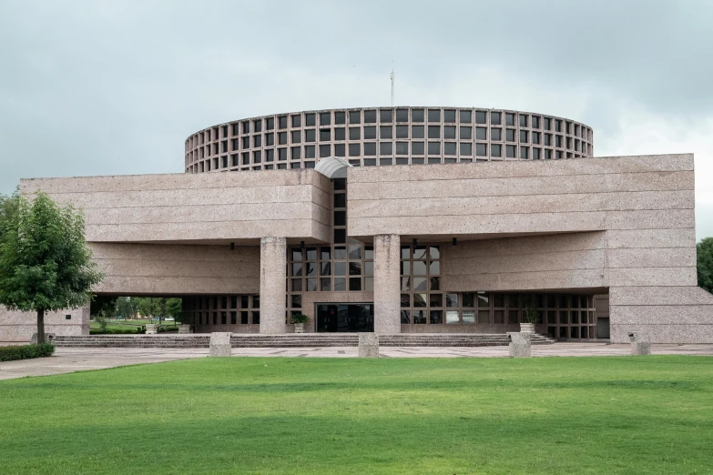 a circular building that appears to have two large windows