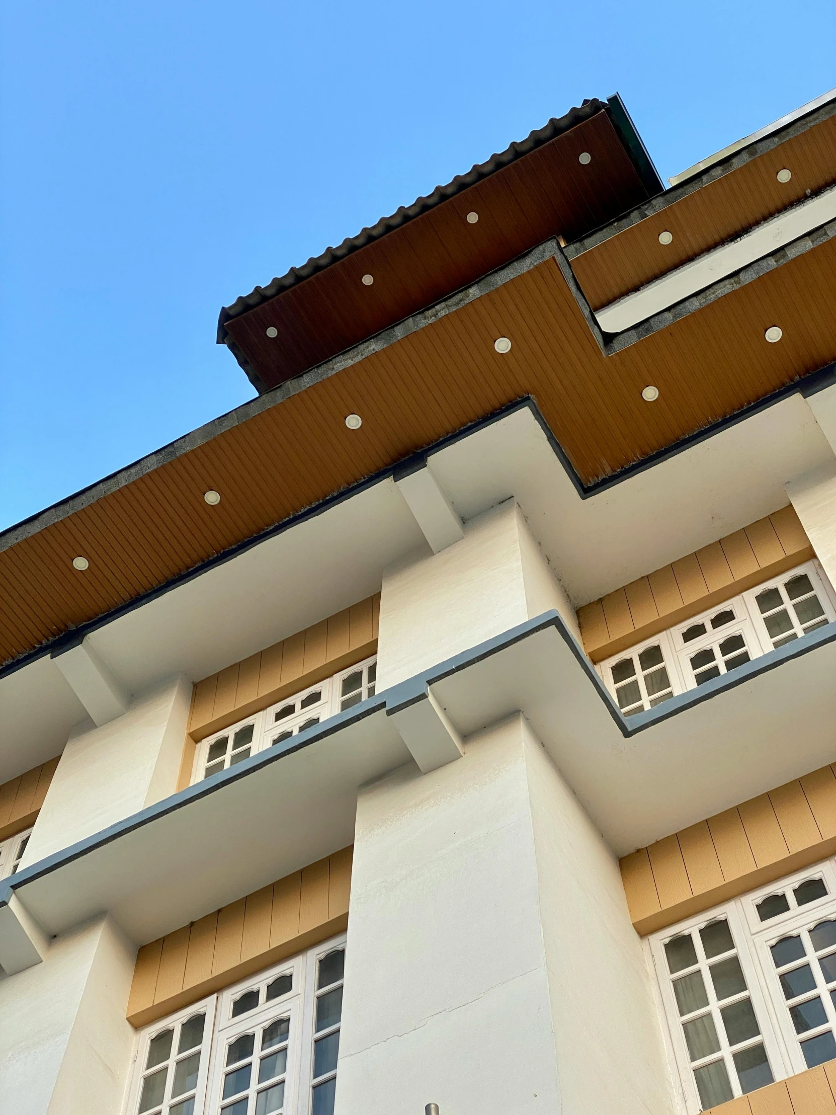 a po of a building with windows and white frames