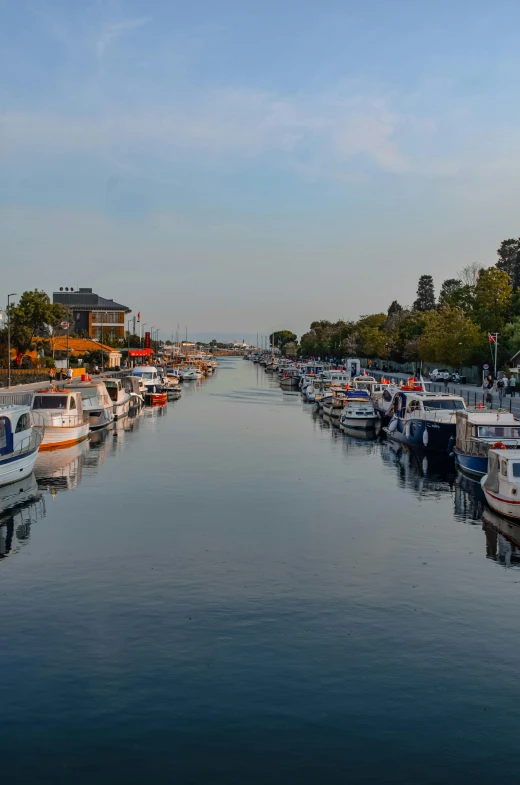 the view of a marina in a city near a river