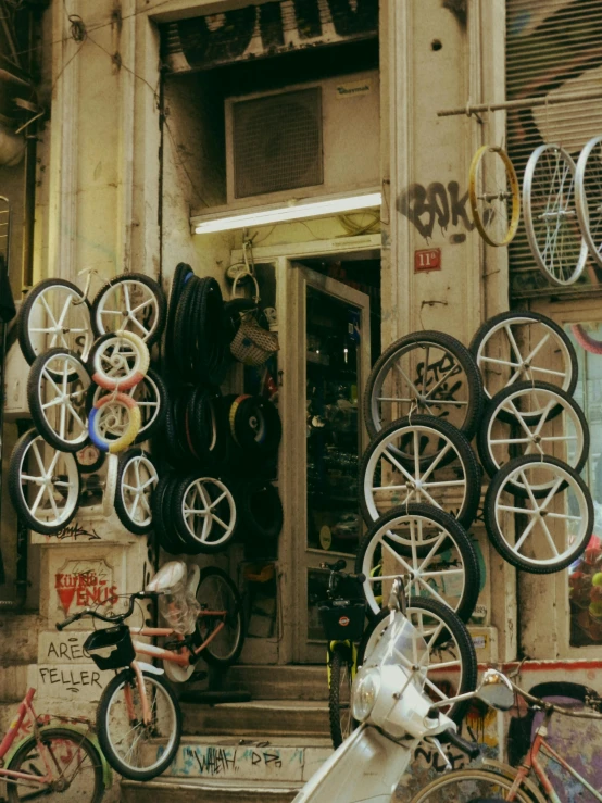 there are many bicycles parked in front of this shop