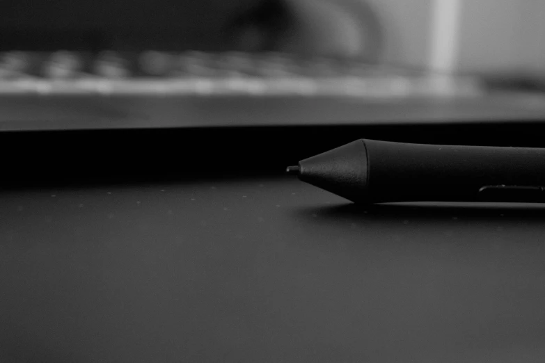 a black and white po of a pen