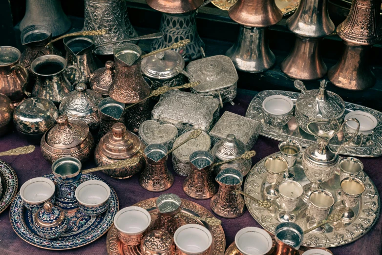 several different types of tea cups and plates