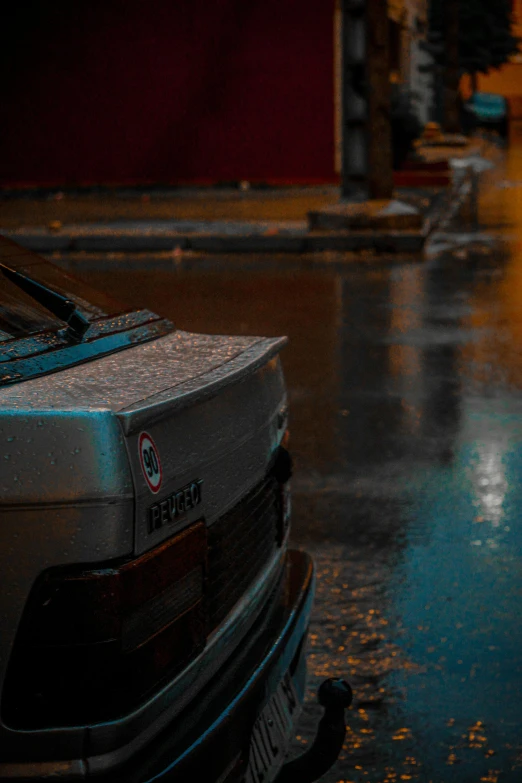 car parked in the rain with the door open