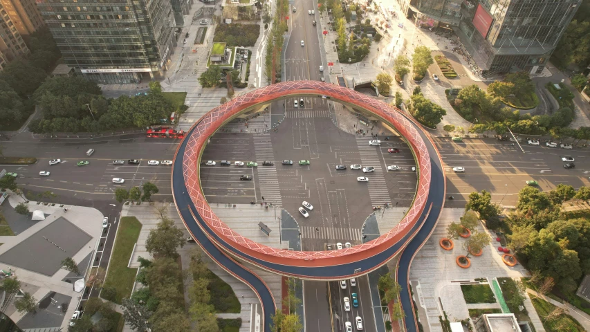 a huge red object in an empty parking lot