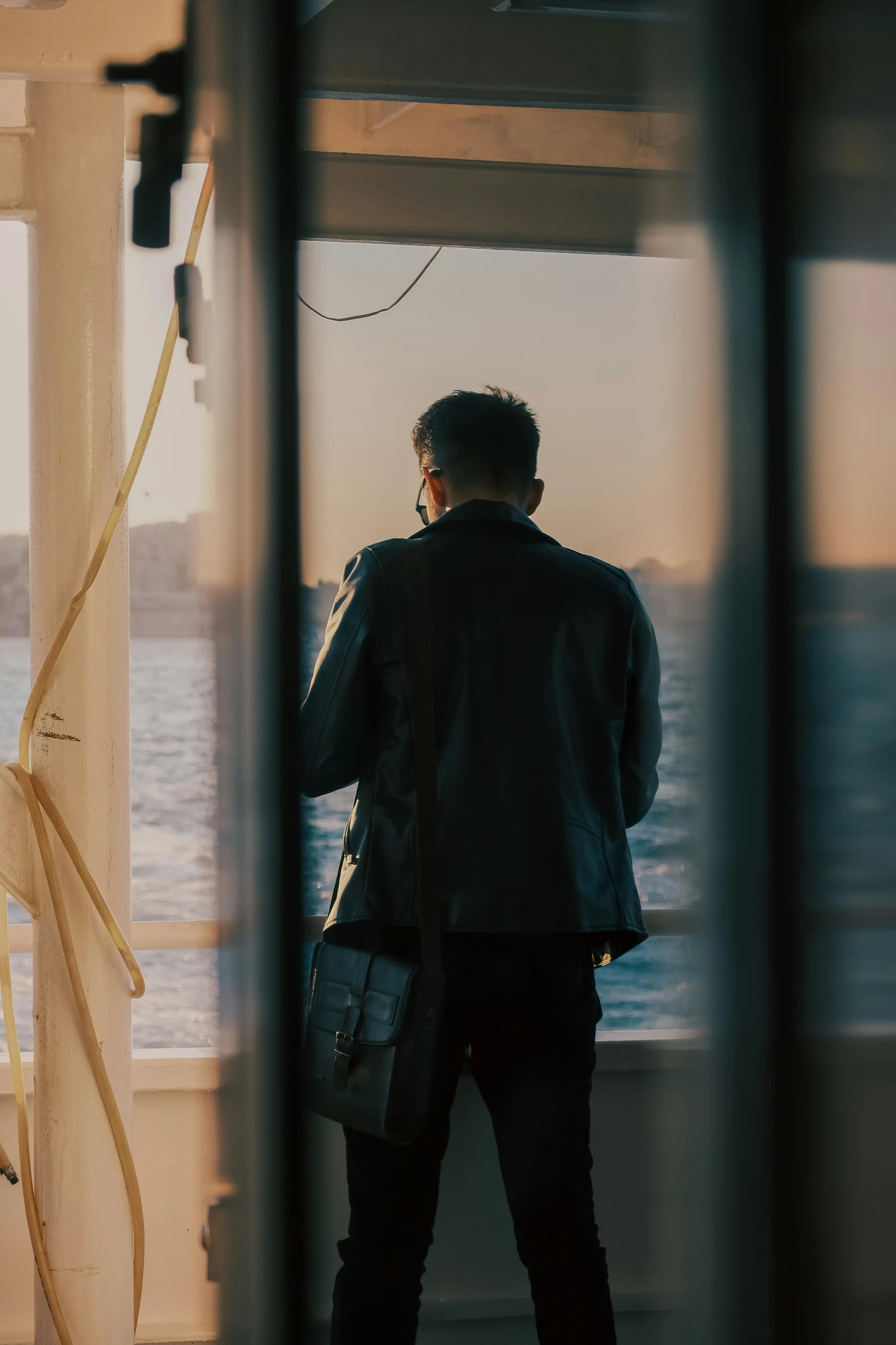 the reflection of a person standing next to the water