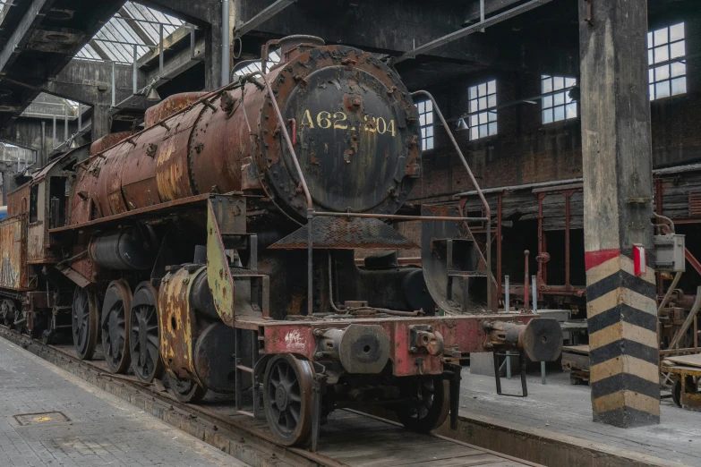 the old train car is rusty in color