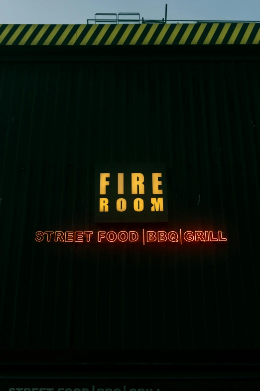 the sign is glowing red for a restaurant