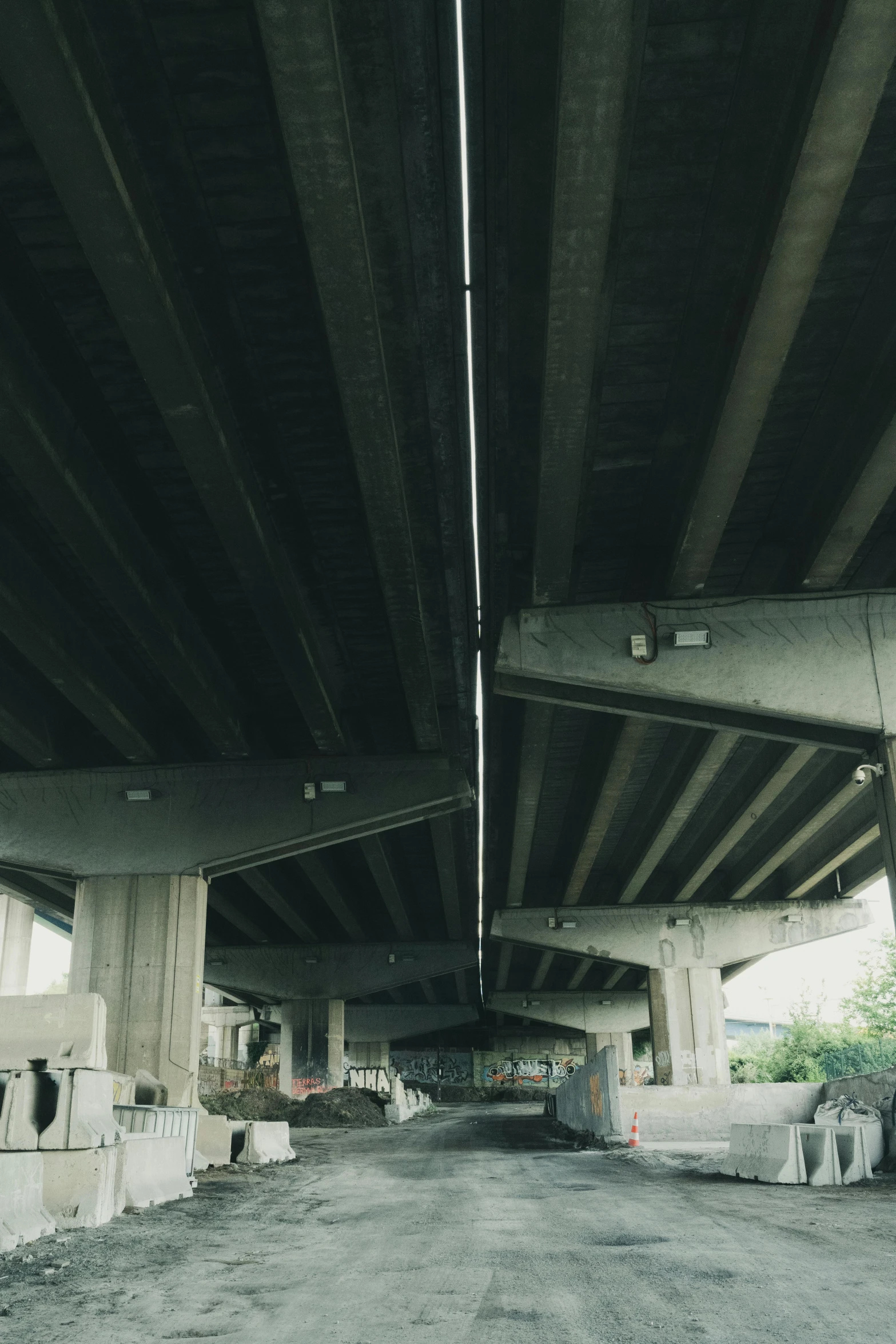 under the bridge a room for furniture in an empty lot