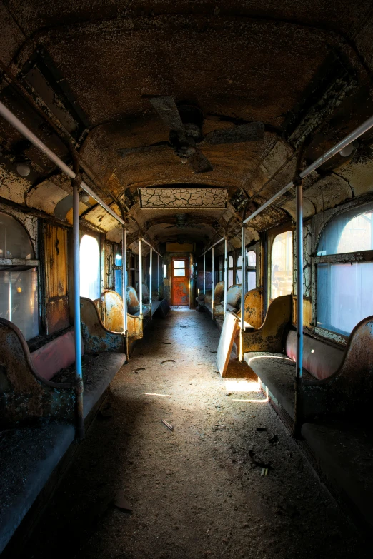 the interior of a run down bus showing very much damage