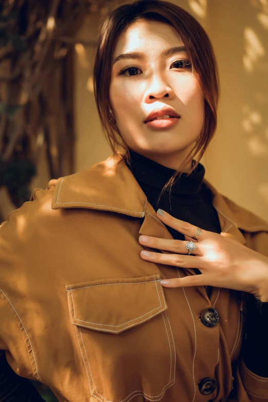 a woman poses for a picture in a po booth