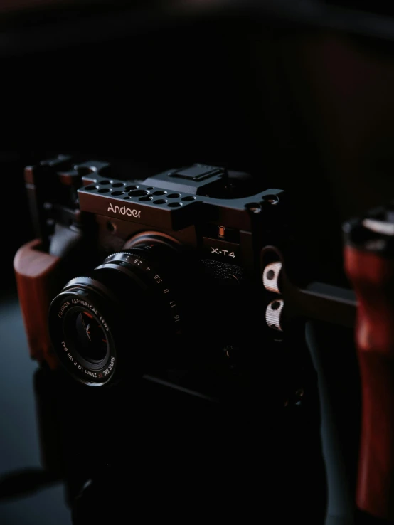 a dark room with an electronic device and camera