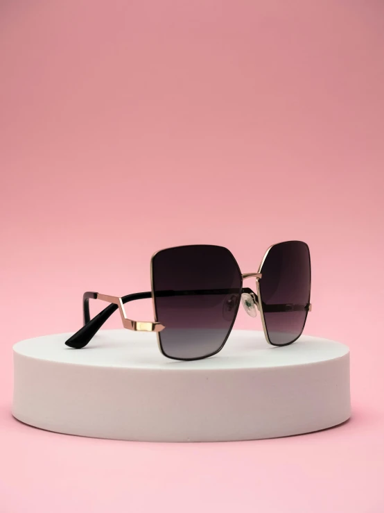the front view of the sunglasses is black, with pink