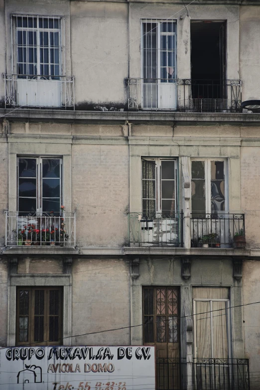 an apartment building with balconies and balconies