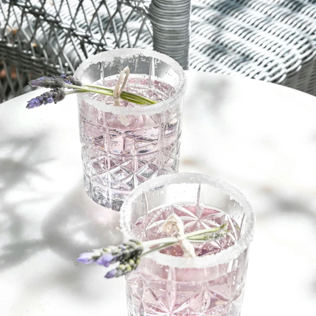 lavender flower in glasses of water on table