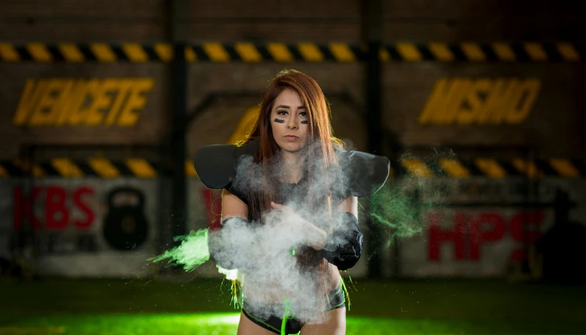 a beautiful woman with her back to the camera posing with smoke