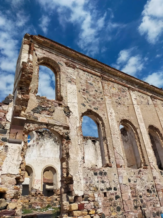 a large castle structure that has some doors in it