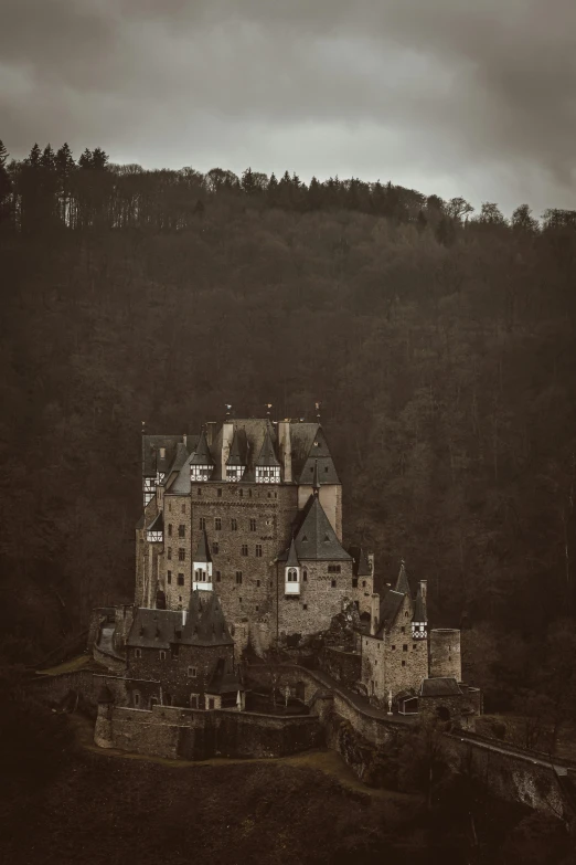the old abandoned castle is near a mountain