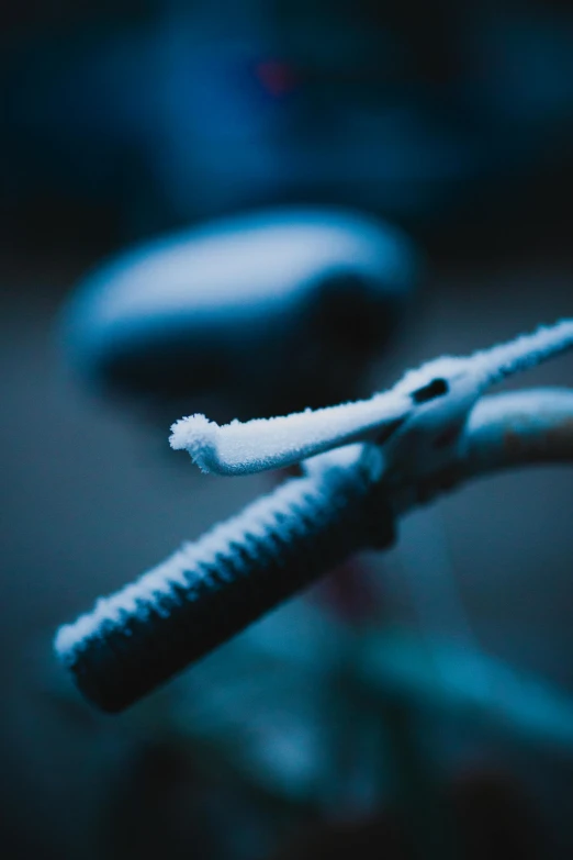 a toothbrush sits on a table in front of a computer