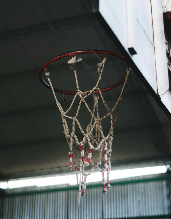 a basketball going through the net for his team