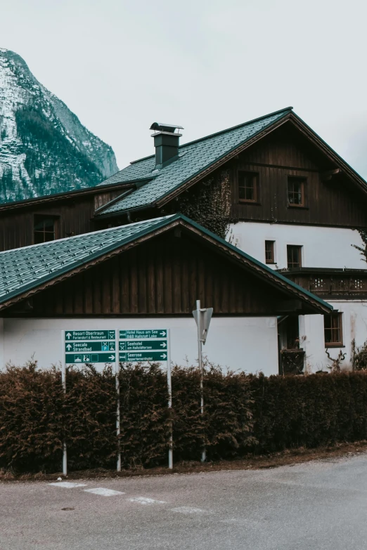 a building with some green plants near by