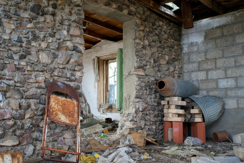 the room is filled with assorted bricks and debris