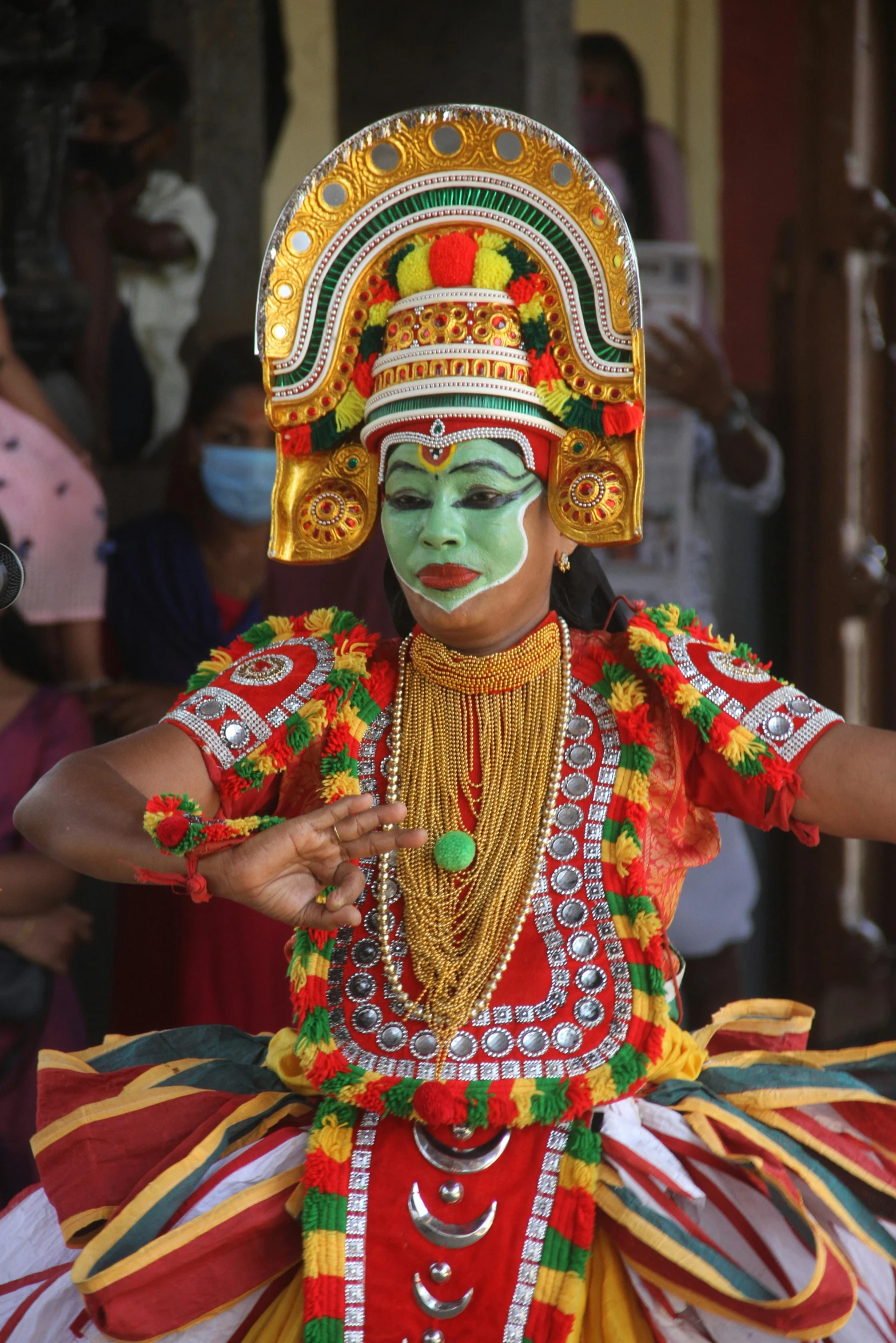 a person dressed in a costume and holding soing