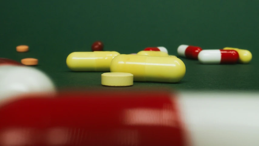 a group of pills laying on top of a table