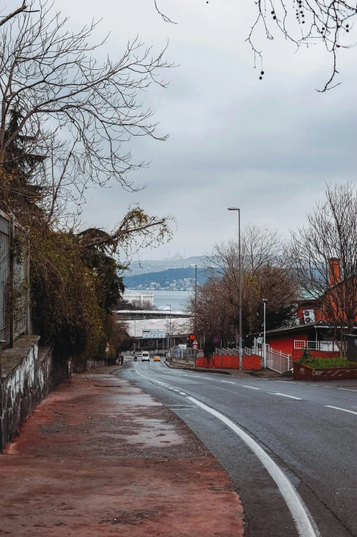 the road is lined with brick walkways