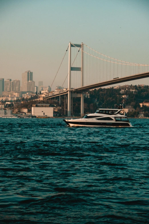 a large white yacht in a body of water