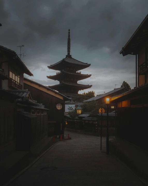 the buildings have three tiered pagodas on them