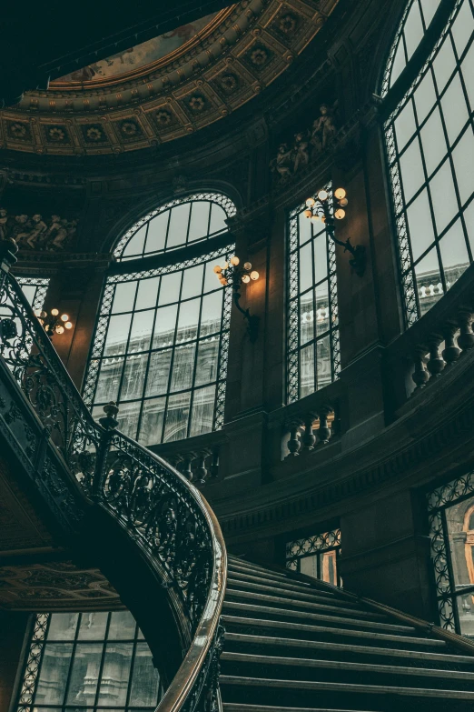 a staircase is seen inside of a large building