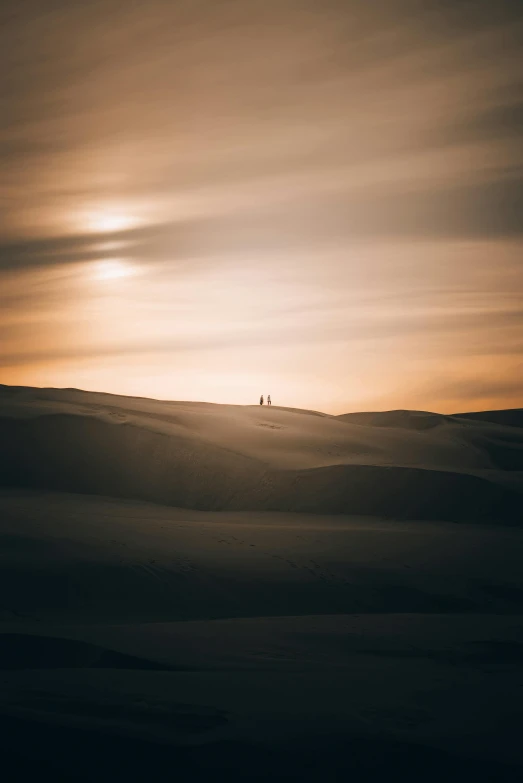 some desert like landscape that is almost covered in sand