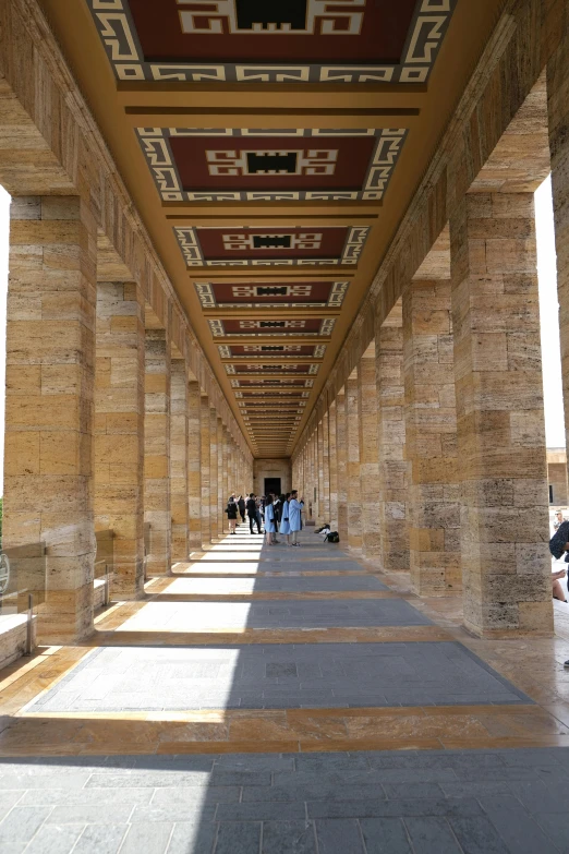 a large long hallway leading to two different levels