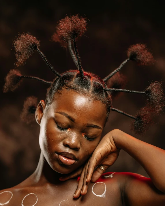 an african girl with many different colored hair