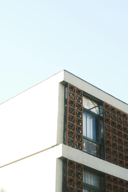 an exterior view of a large white building