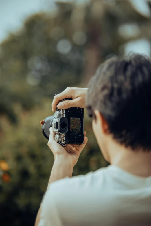 a person is taking a picture with their camera