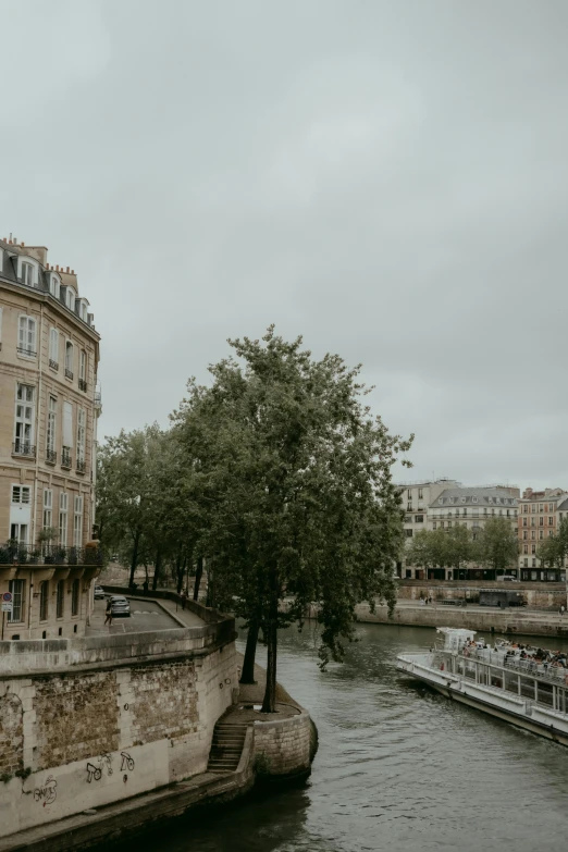 a river with several boats on it and buildings