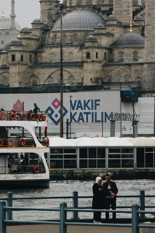 a boat on the river with people sitting on it