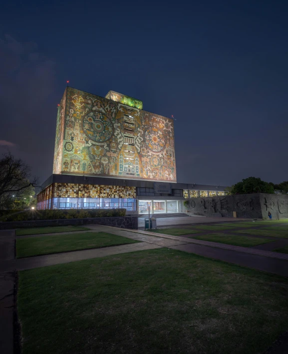 a large building with many lights inside of it