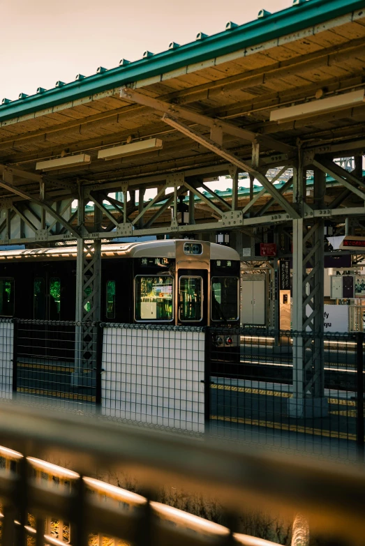 an empty train station is pictured at dusk