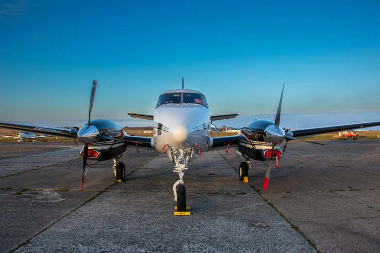 this is a small airplane sitting on a runway