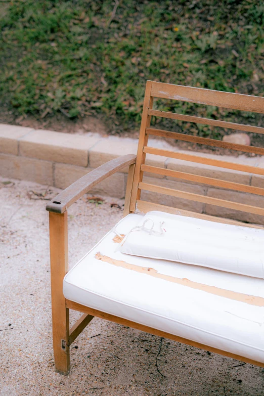 a bench that is sitting in the dirt