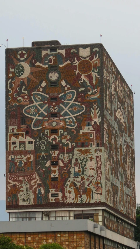 an old building with a decorative mural on it