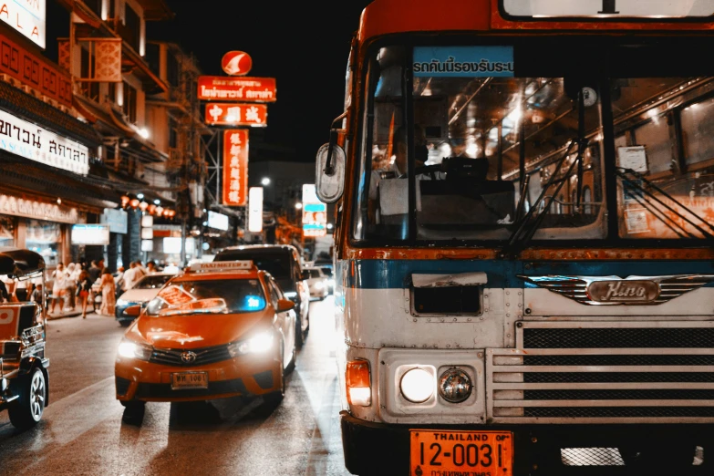 the public transportation has pulled into traffic near many business