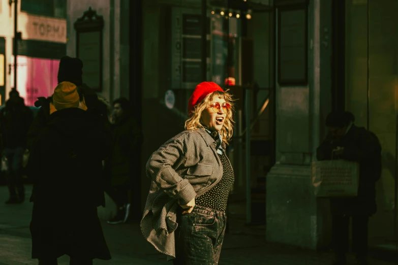 a person in the city with a red hat