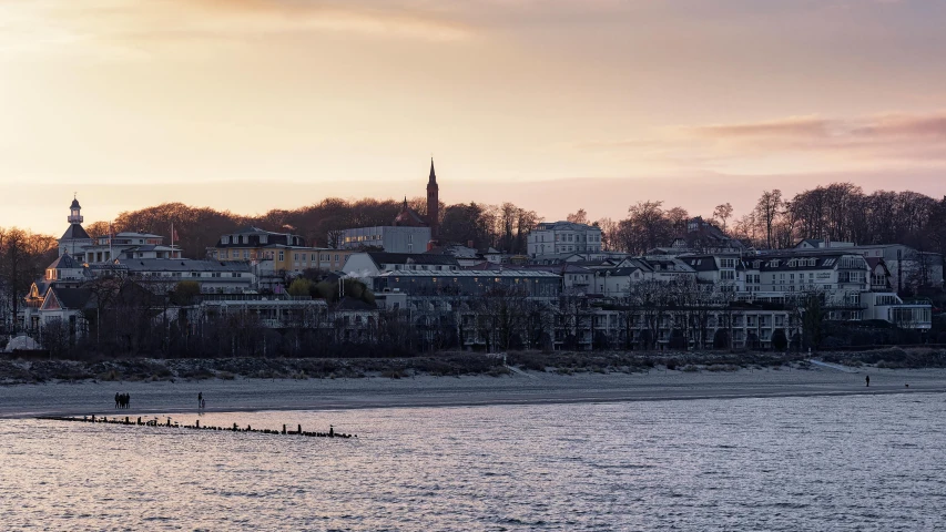 the city is situated on a beach with people